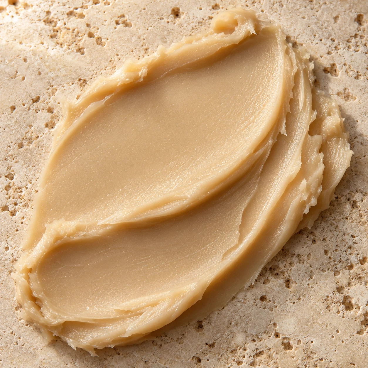 Pale, smooth cosmetic balm illustrating a look-alike blend